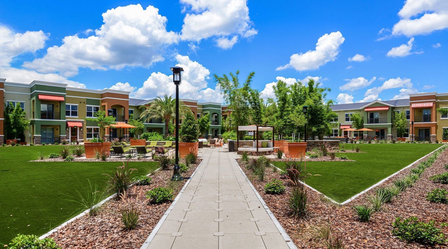 a path with buildings on the side