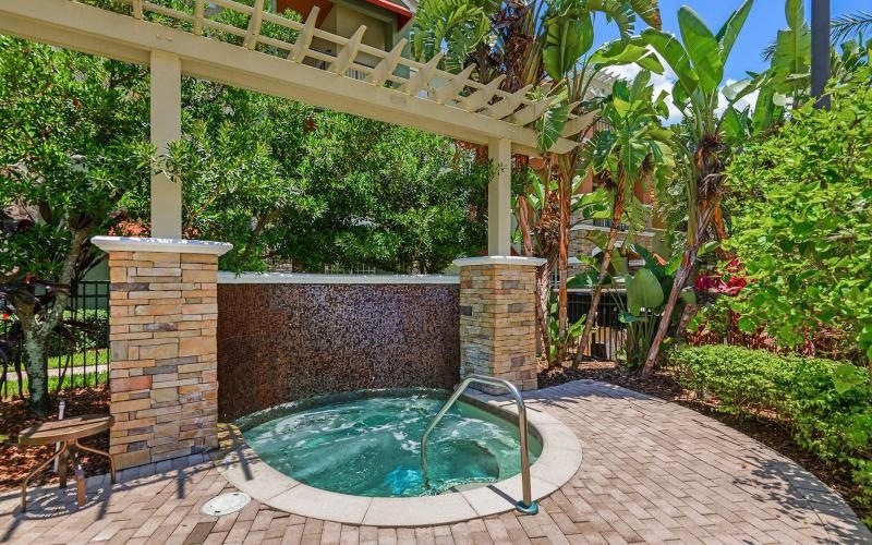 a water fountain in a backyard