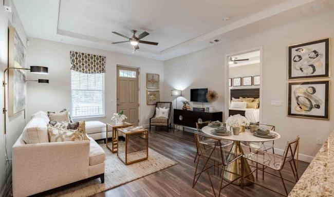 a living room with a couch and a table