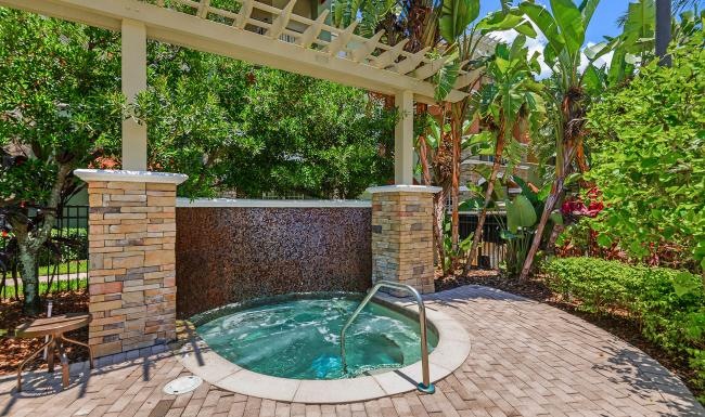 a small pool in a backyard